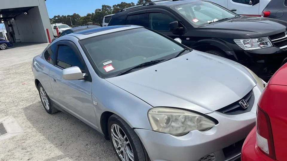 Silver compact hatchback viewed from the front side