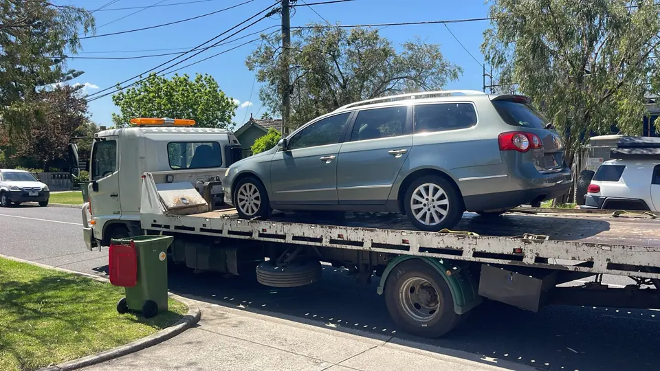 Grey SUV loaded for collection