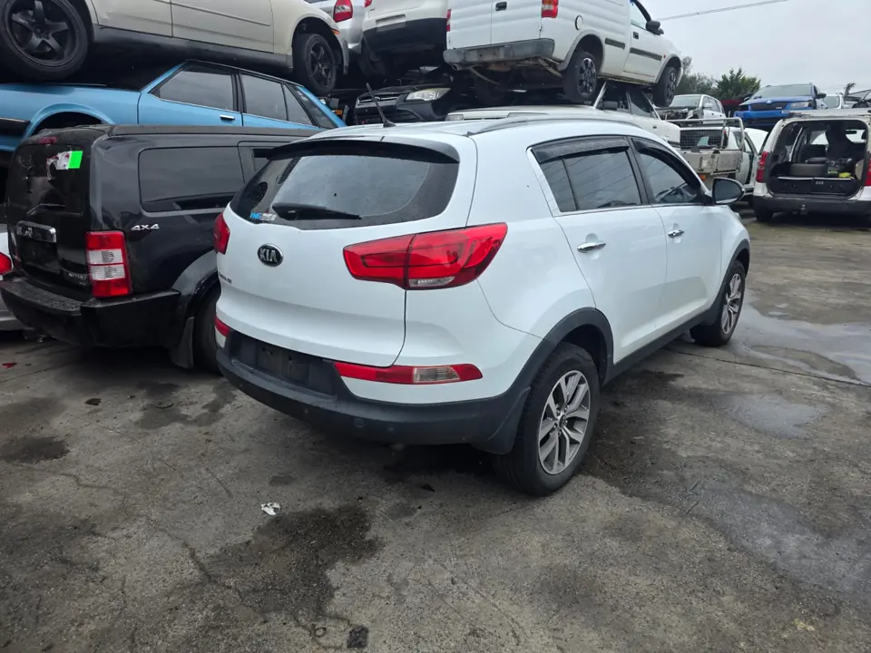 White SUV parked indoors