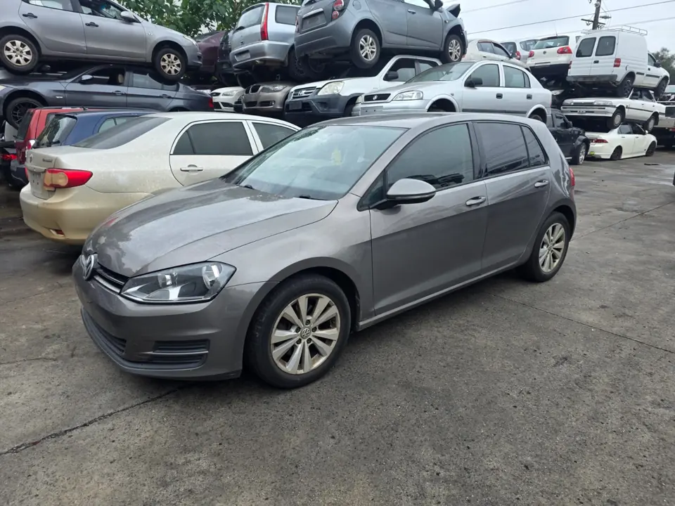 Silver sedan in a vehicle yard
