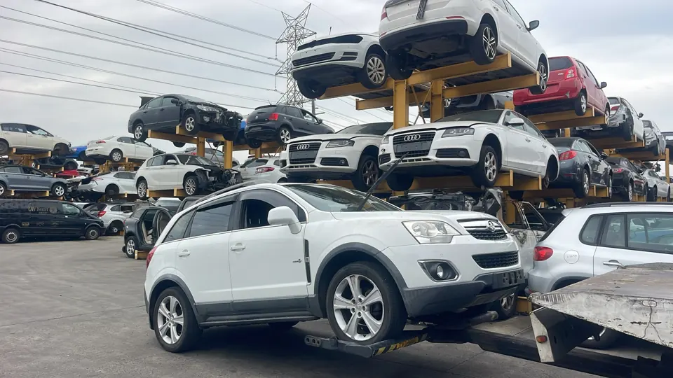 White SUV in a vehicle yard