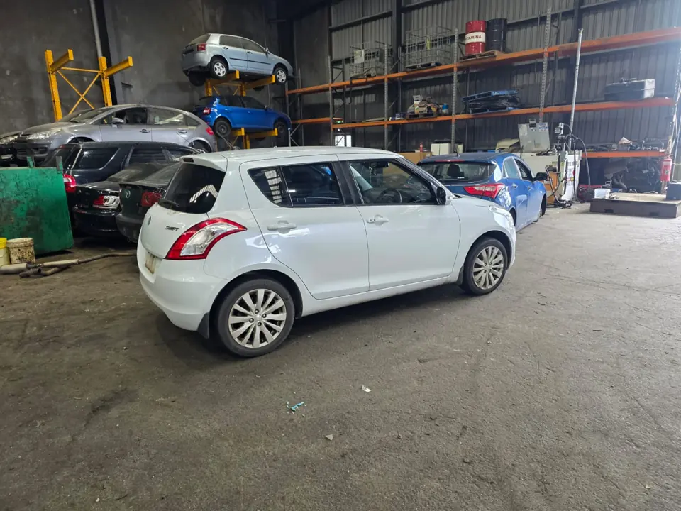White hatchback indoors