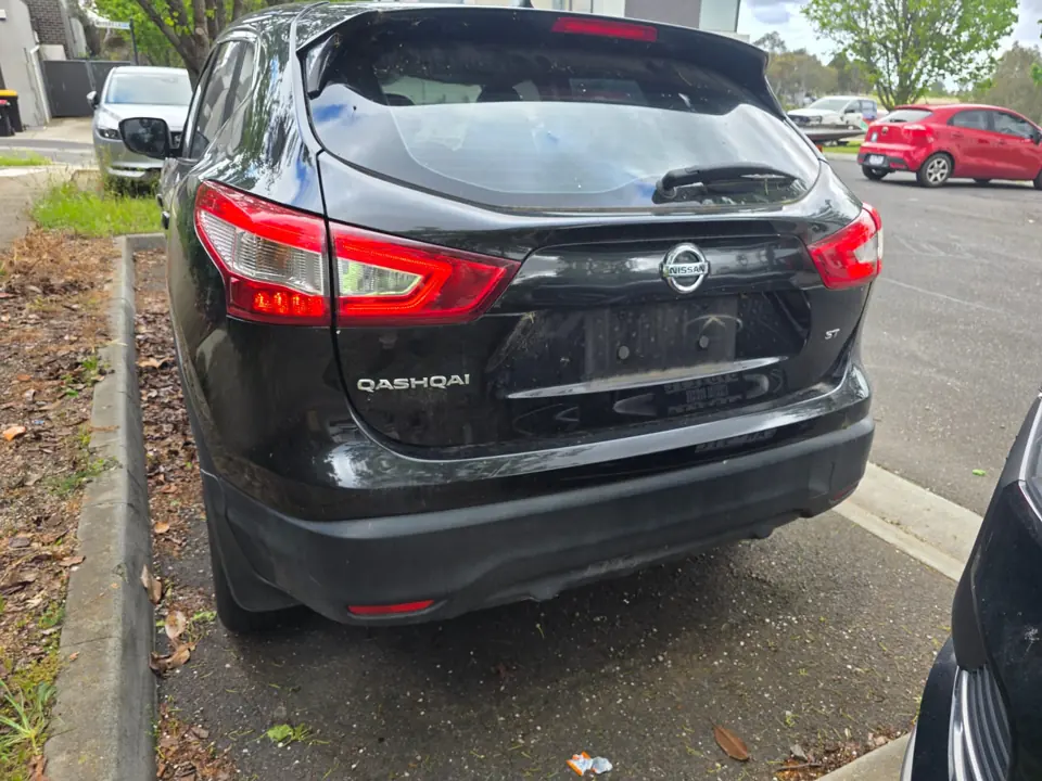 Dark SUV parked indoors